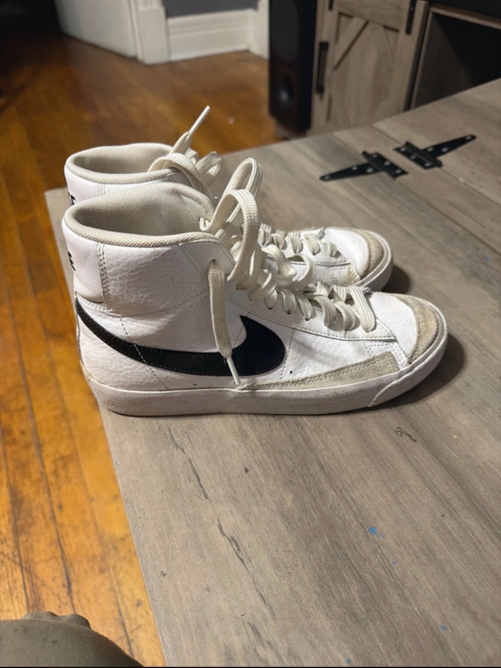 Nike White High-Top Sneakers with Black Swoosh size 4.5